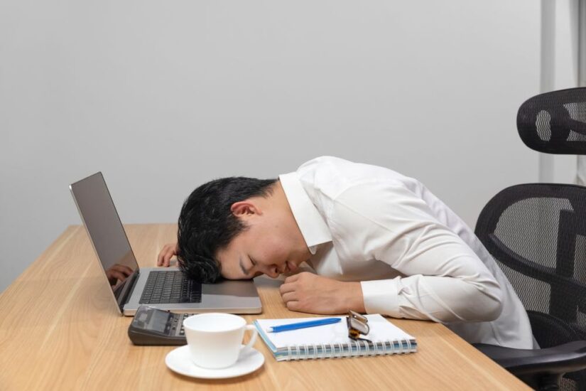 Man Sleeping by laptop