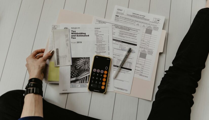 Calculator and financial documents for tracking disability back pay