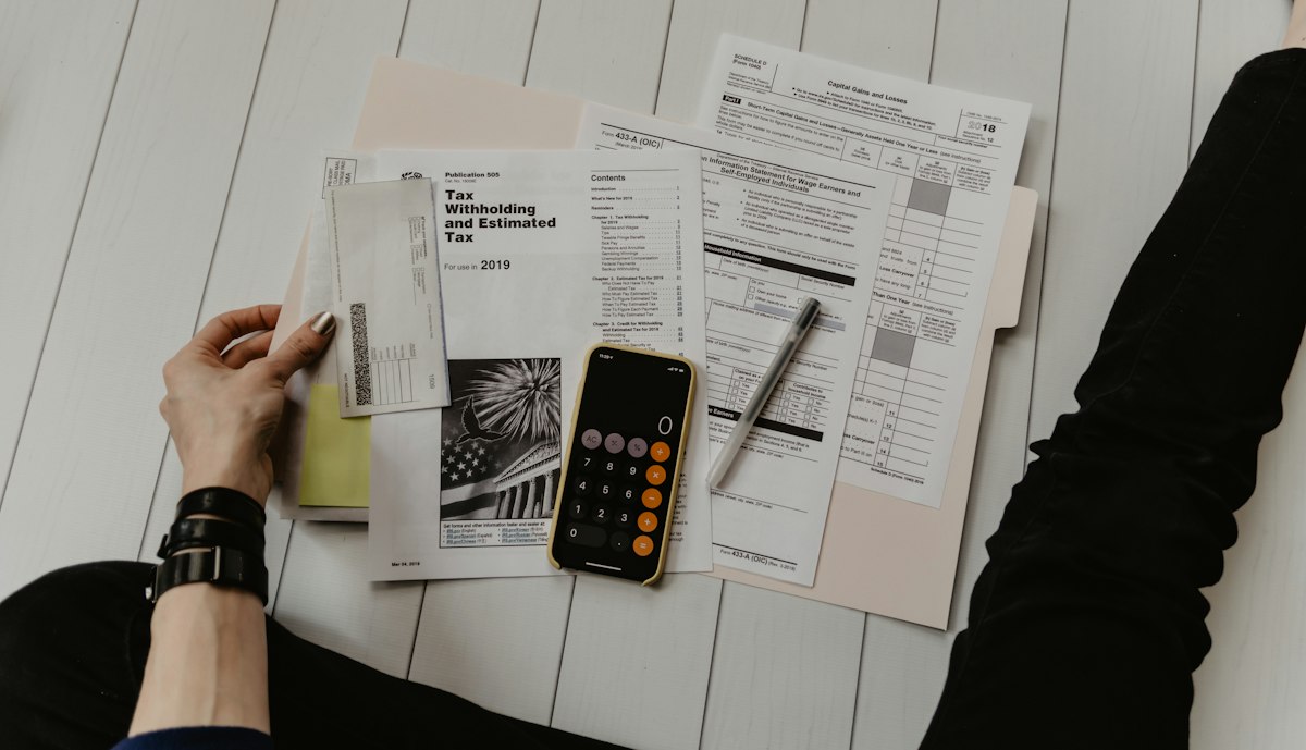 Calculator and financial documents for tracking disability back pay